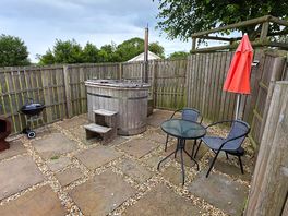 Log fire hot tub and patio