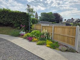 Various well kept flower beds around the site