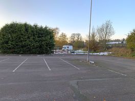 View from the toilet block over the car park to my van in the field.