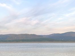 Evening view with the high tide and provided fire pit