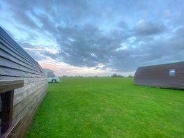 Plenty of space and behind the pods was large open space.