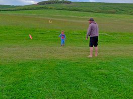 Playing in front of our tent