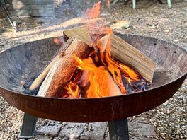 The fire pit with wood etc provided.