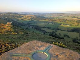 Top of high wheeldon looking over with the site below
