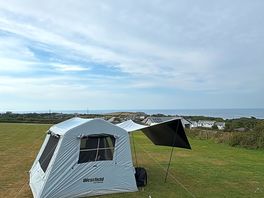 Great view, spacious pitch. quite windy that day.