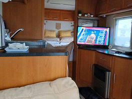 Nice and snug in our caravan on site with nasty weather outside