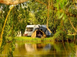 Pitches tucked away by the river