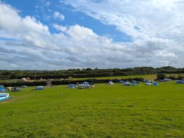 View from top of hill to camping area