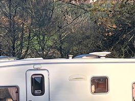 Just under the white horse