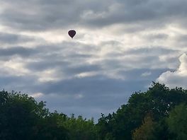 Hot air balloon across the site