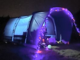 Late night cosy tent in beautiful night sky