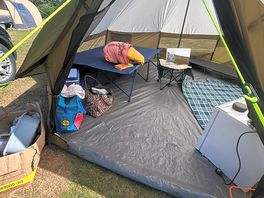 Inside our tent setting up.