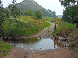 Ford over the river dove with parkhouse hill in the distance