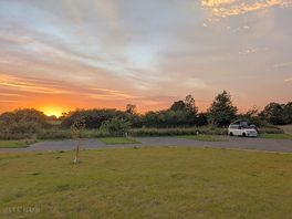 Sunset looking from the lake.