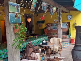 Cosy and colourful sipping area. there are plenty of games available.
