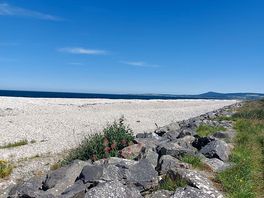 Beach 1 min walk from site to the east