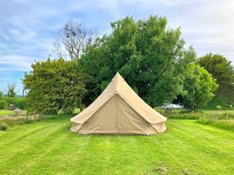 Rent a pre-pitched bell tent including pitch fee. Bring your own camping gear.