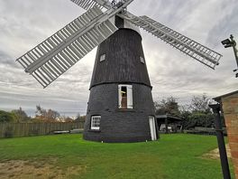 Restored windmill in village, regularly milling flour available for sale when open