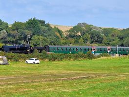 Train runs through the back of the site