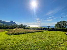 Grass pitch with sea views