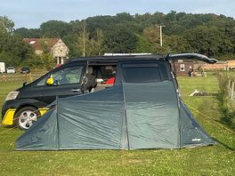 Tent and camper van side by side at two jays farm camp site
