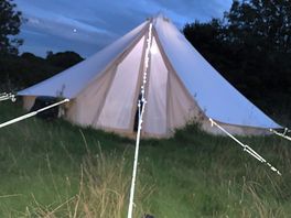 Tent at night, lit by solar leds