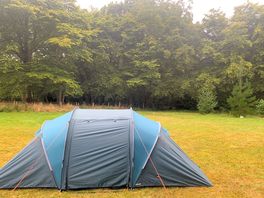 Our tent pitched in the field