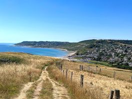 The view from the side hill next to the site into the beach.