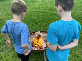 Fire pit was provided with a bit of wood to start you off and more available to buy - winner