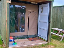 Converted shipping container.