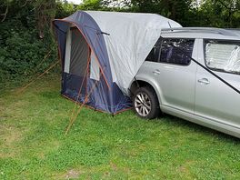 Car camping with tailgate tent