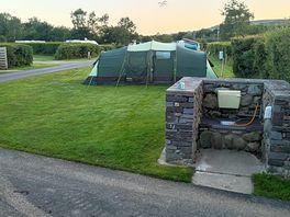 Waste disposal unit - and our tent in the back ground.