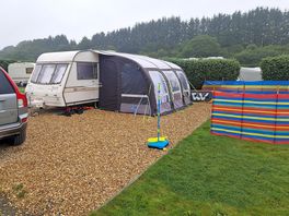 Gravel and grass pitch