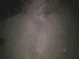 Stars seen through a break in the clouds.