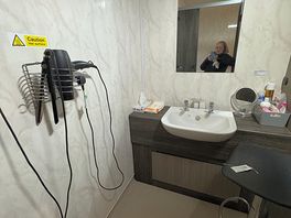 Individual washrooms with products and electronics