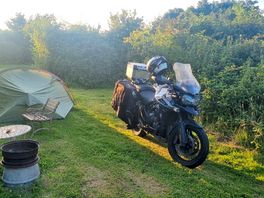 Pitched tent with bike