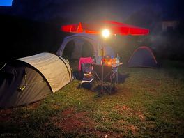 Large tent pitch on the grass