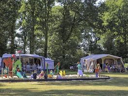 Pitch your tent around the play area