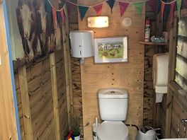 One of the toilets - so clean and love the art on the walls. there are also en-suite bathrooms