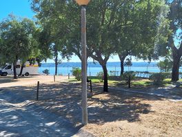 View of pitch and lake beyond