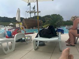 Relaxing by the pool
