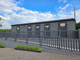Toilet and shower block, with kitchen.