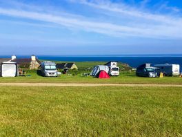 Top of the field on the outer edges with views of the Irish Sea