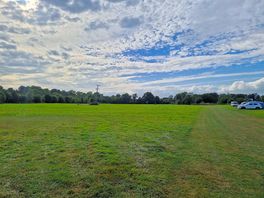 Large open field with plenty of spaces between pitches