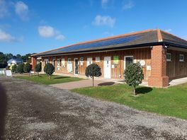 External view of bar, reception and toilets.
