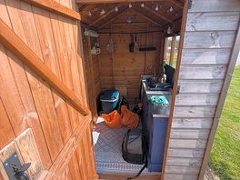 Fully stocked kitchenette with gas camping stove and private sink