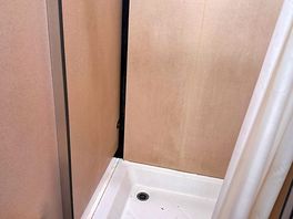 Filthy broken showers that do not work.