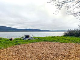 Dyfi pitch with fire pit, overlooking the estuary and the village of Borth