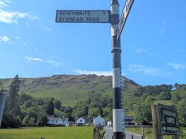 Follow this sigh towards seathwaite for a very short distance to get to the site