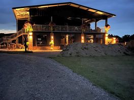 Black barn at night